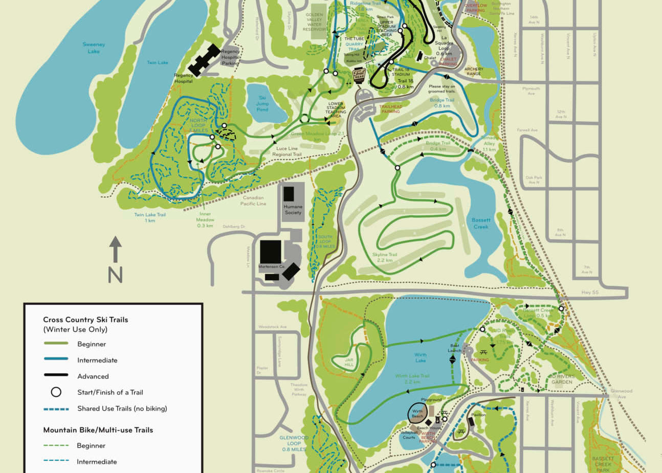 A stylized park map of Theodore Wirth Regional Park with labeled trails, lakes, paths, and a legend on a pale beige background.