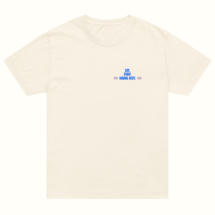 Beige t-shirt with blue text on a white background